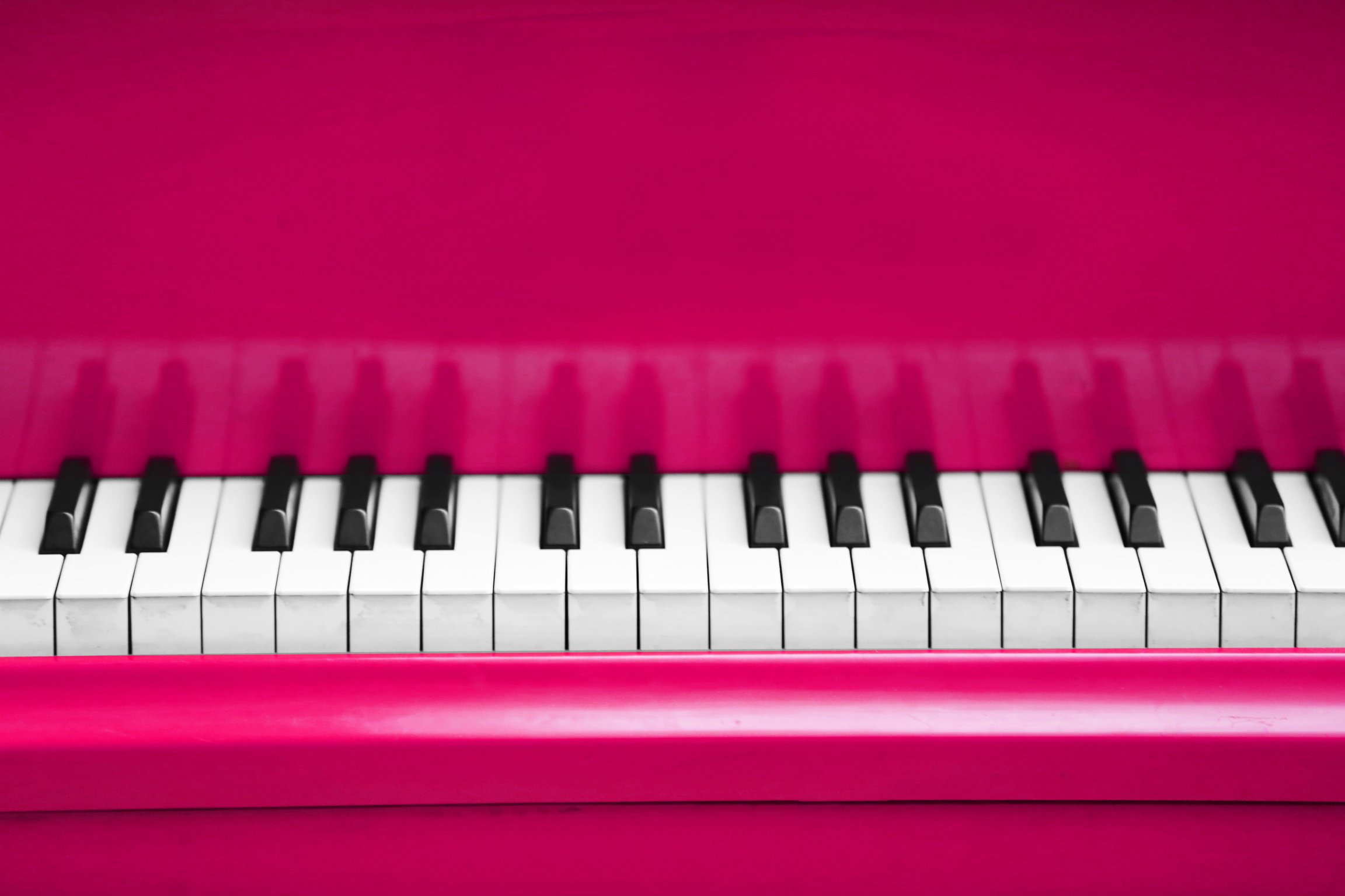 Piano Keys of Pink Piano Close up